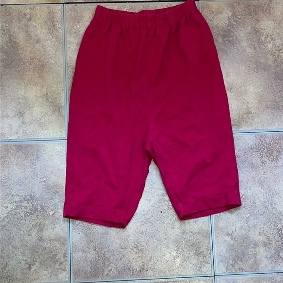 Woman within biker shorts - Picture 1 of 1